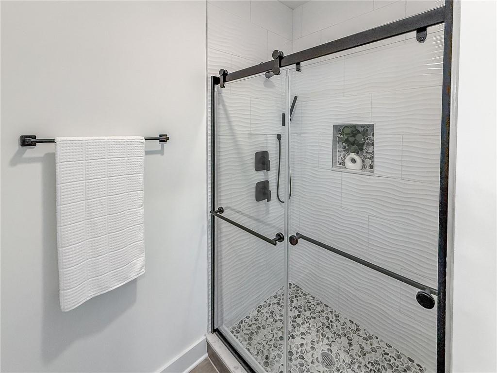622 Windom Street Pittsburgh, PA 15203 - Photo 9 of 26 Beautiful wall tile with niche accented by cool floor tile.