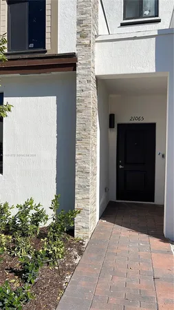 a entrance to house with yard