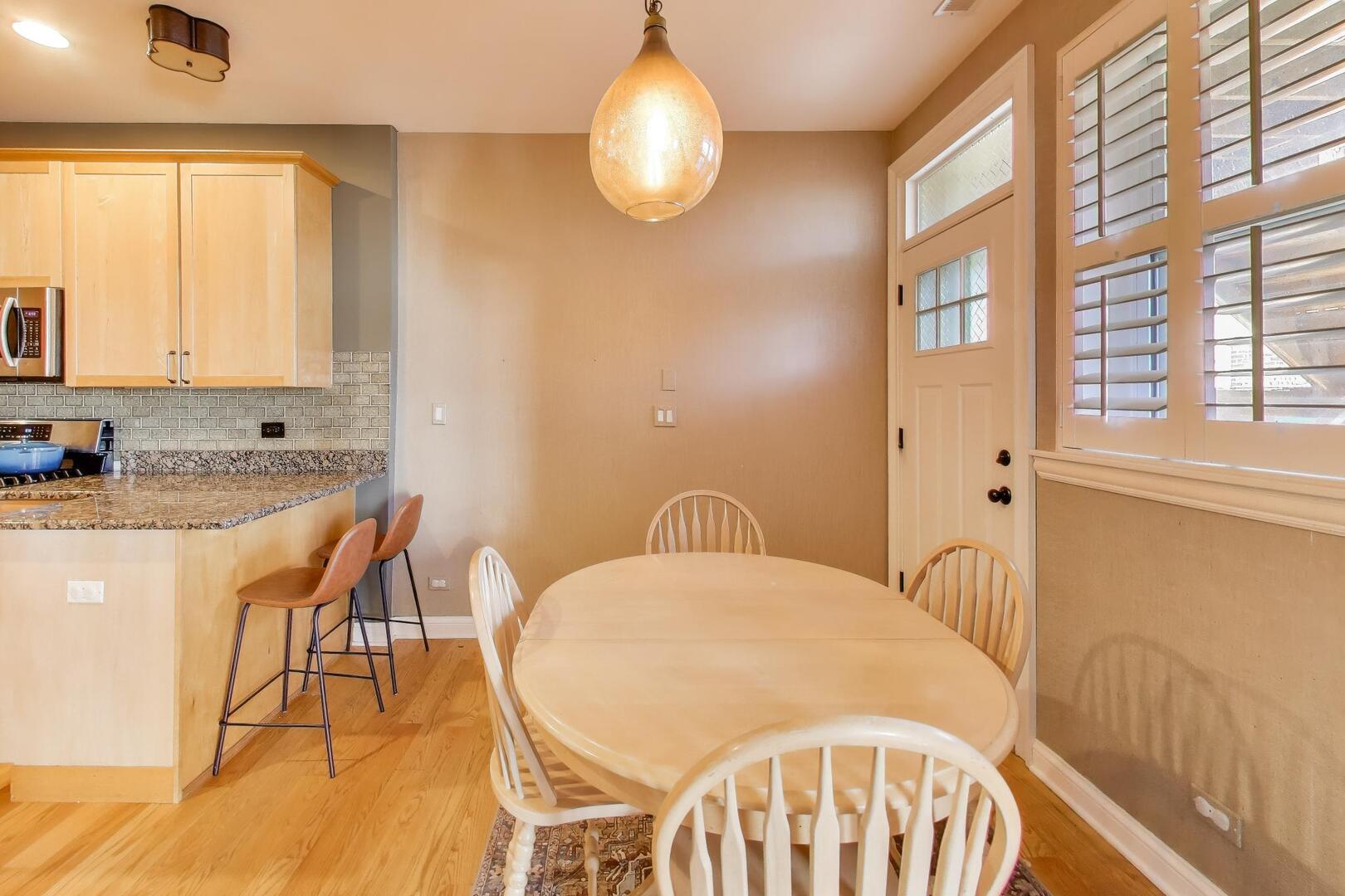 2537 North Hamlin Avenue, Unit 1S Chicago, IL 60647 - Photo 7 of 22 a spacious bathroom with a granite countertop sink and a mirror