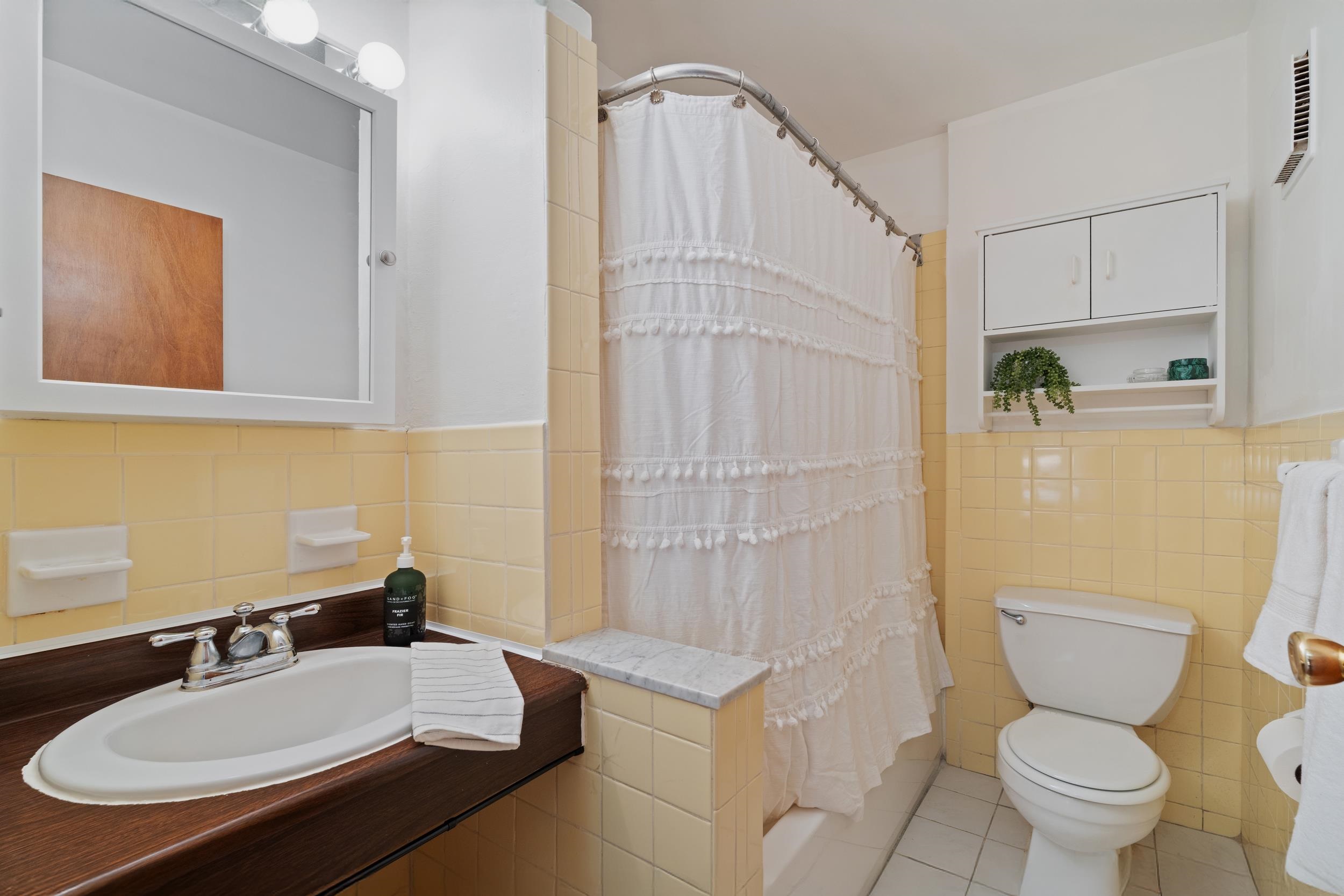 56 68th Street, Unit 8 Guttenberg, NJ 07093 - Photo 13 of 27 a bathroom with a sink toilet a mirror and shower