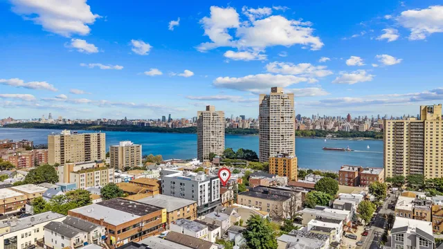 a view of city with ocean