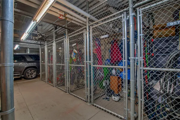 a view of a garage with a car parked