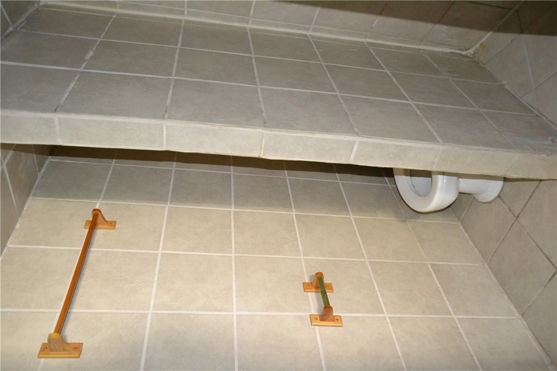 505 Foch Street Bryan, TX 77801 - Photo 7 of 17 Full bath featuring tile walls and tile patterned flooring