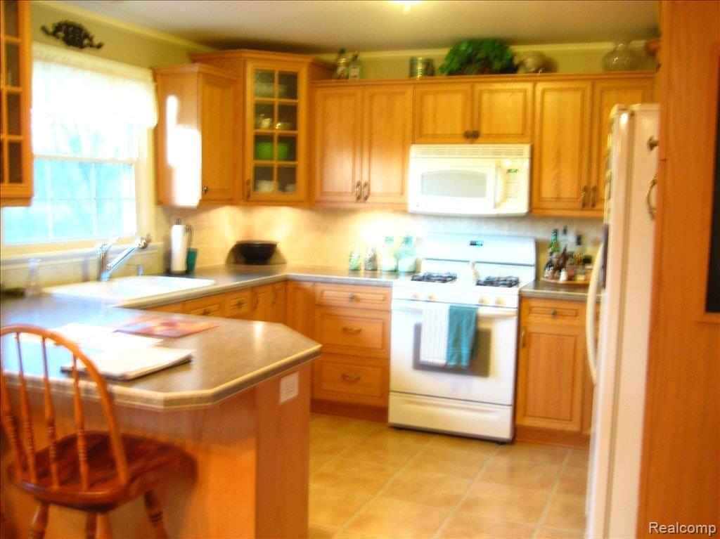 13635 Grafton Road Carleton, MI 48117 - Photo 10 of 18 Updated kitchen