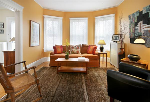 44 Harrison Street, Unit 2 Brookline, MA 02446 - Photo 2 of 6 a living room with furniture and a window
