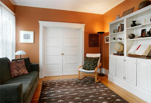 44 Harrison Street, Unit 2 Brookline, MA 02446 - Photo 4 of 6 a living room with furniture a rug and a window