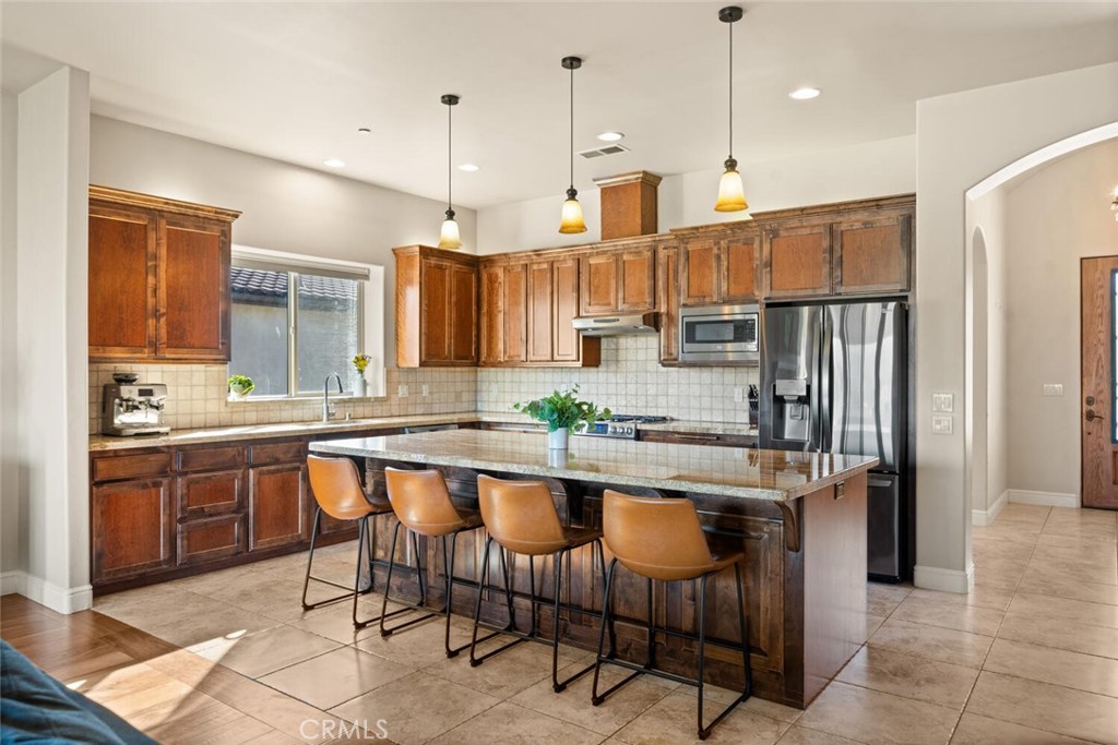 3368 Summit Ridge Terrace Chico, CA 95928 - Photo 3 of 43 Large kitchen island open to the living room.