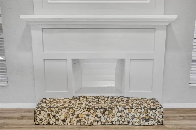 an aerial view of a house with a swimming pool