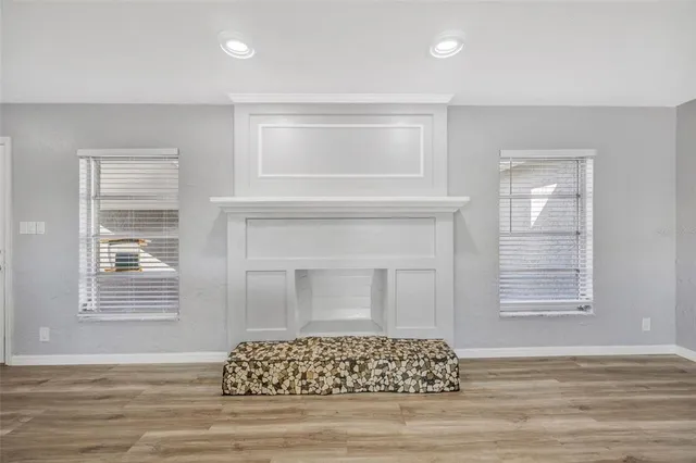 an aerial view of a house with a lake view