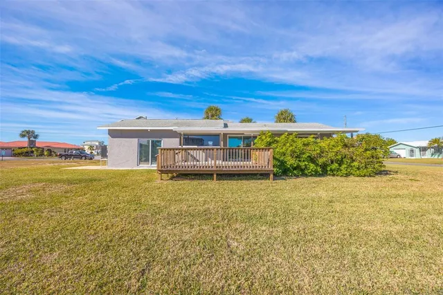 a bathroom with a sink toilet vanity and shower