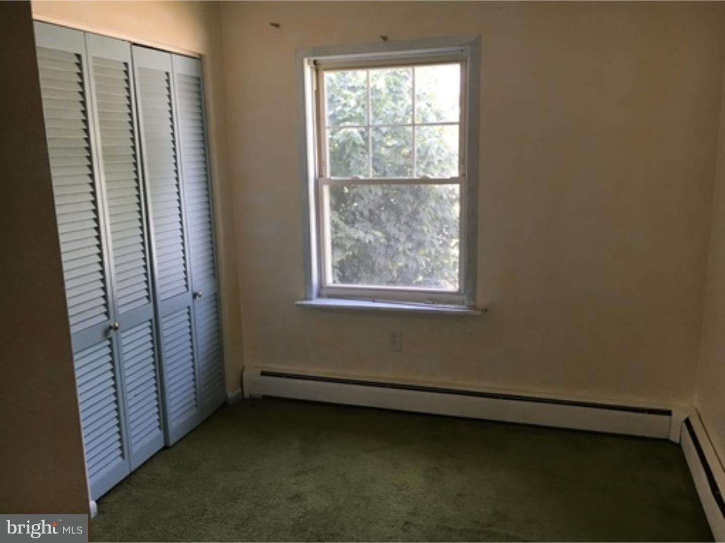 232 Carroll Street Reading, PA 19611 - Photo 8 of 9 a view of a room that has a window in it