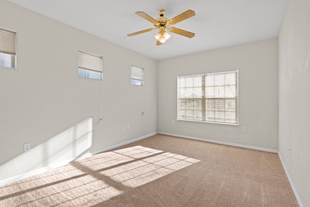 7502 Lazy Creek Drive, Unit B Austin, TX 78724 - Photo 16 of 24 a view of an empty room with a window