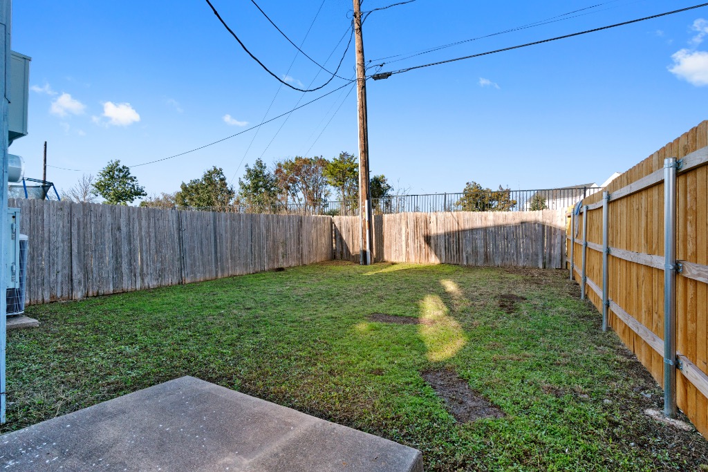 7502 Lazy Creek Drive, Unit B Austin, TX 78724 - Photo 21 of 24 a view of a backyard with plants