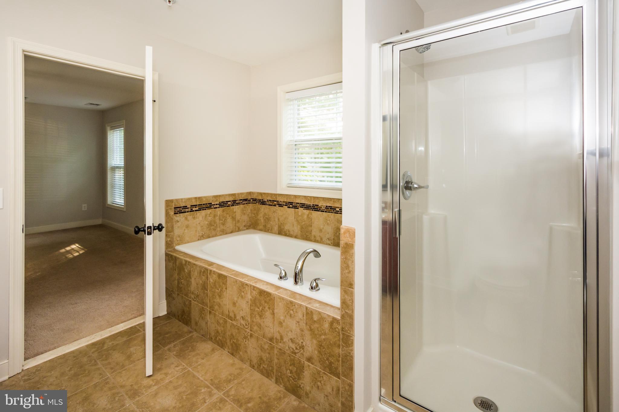4010 Ward Road Pasadena, MD 21122 - Photo 24 of 39 Relax in your beautiful bathroom