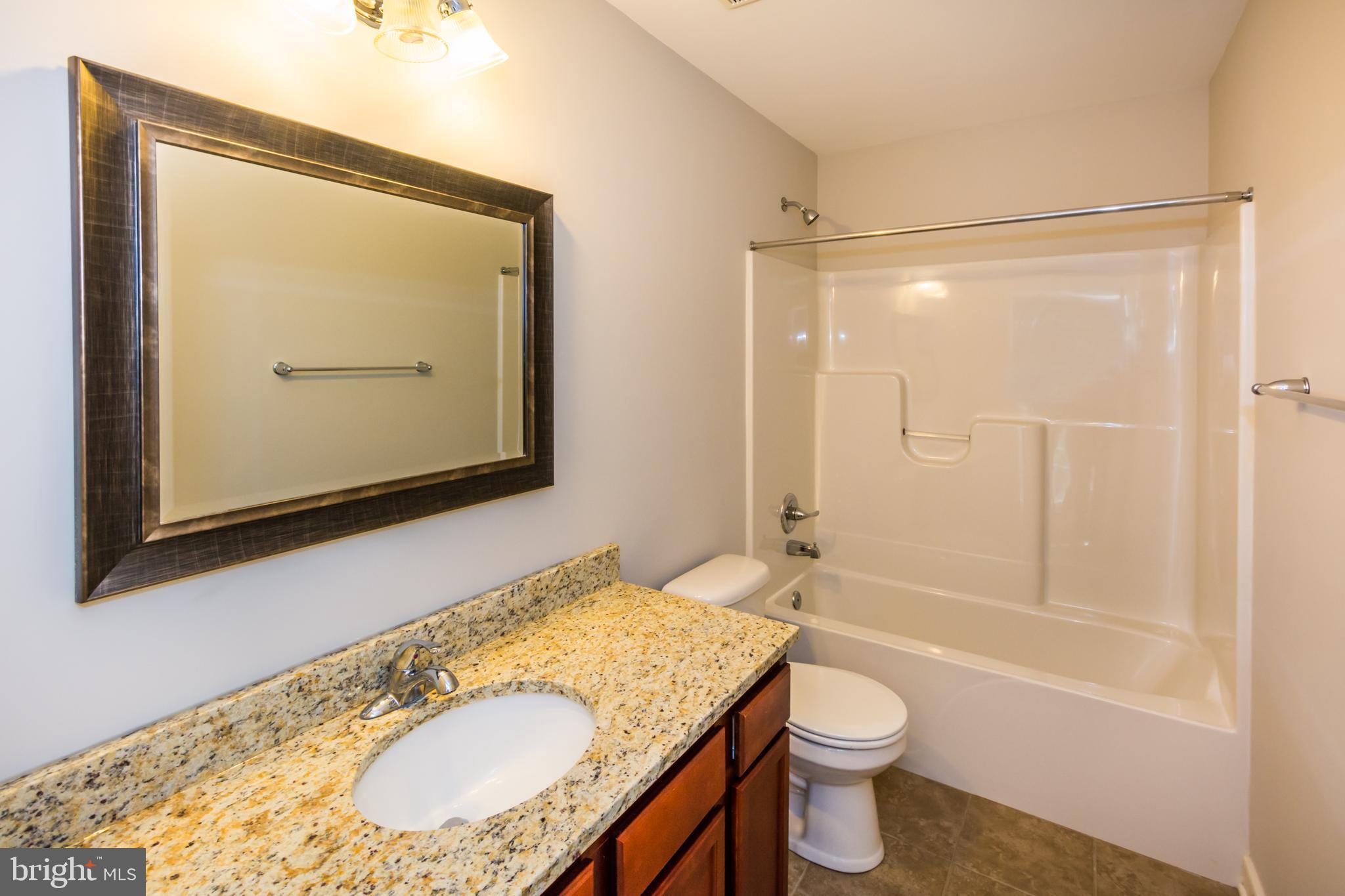 4010 Ward Road Pasadena, MD 21122 - Photo 31 of 39 Second floor bathroom Granite counter