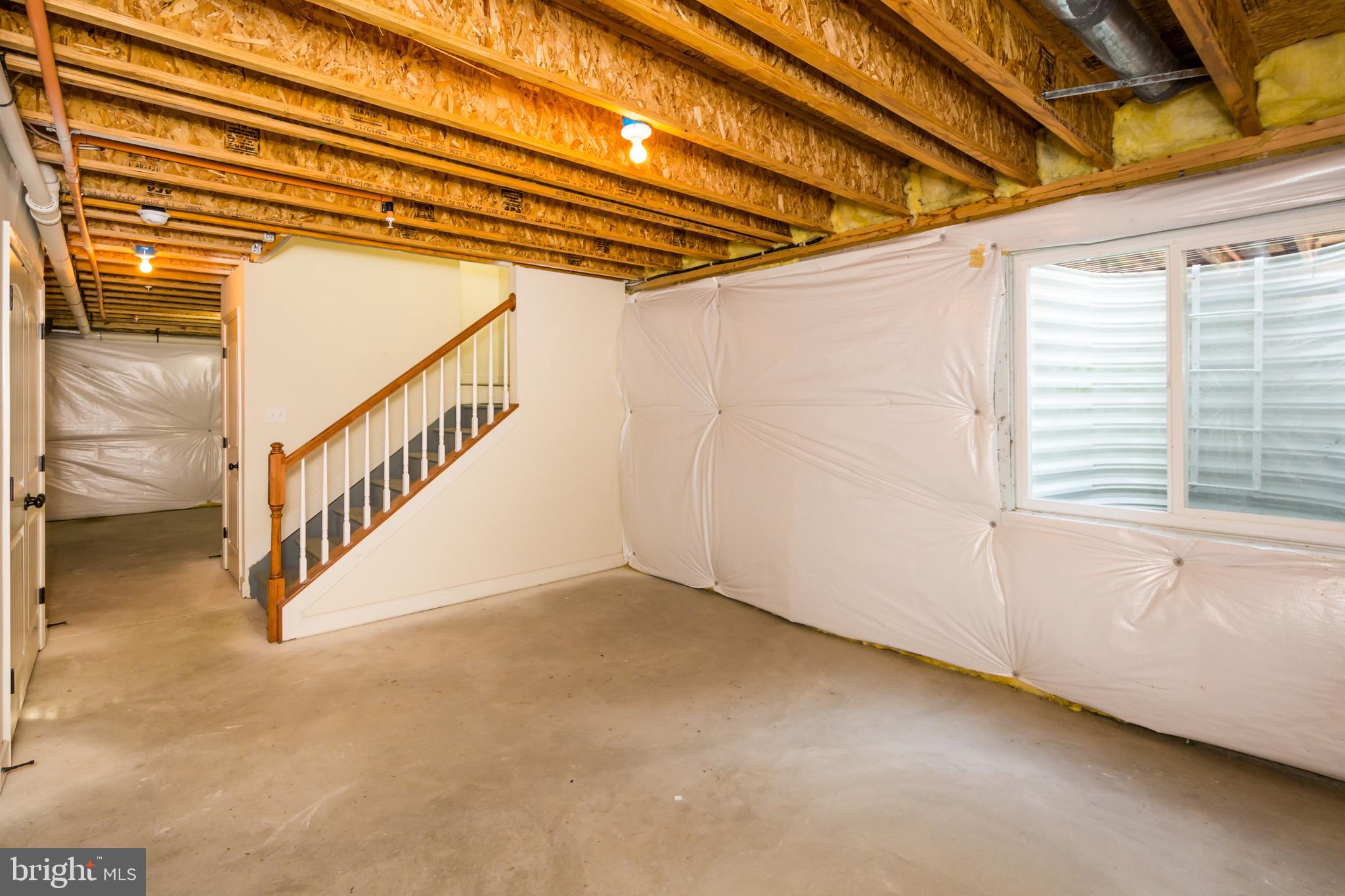 4010 Ward Road Pasadena, MD 21122 - Photo 36 of 39 Large unfinished basement