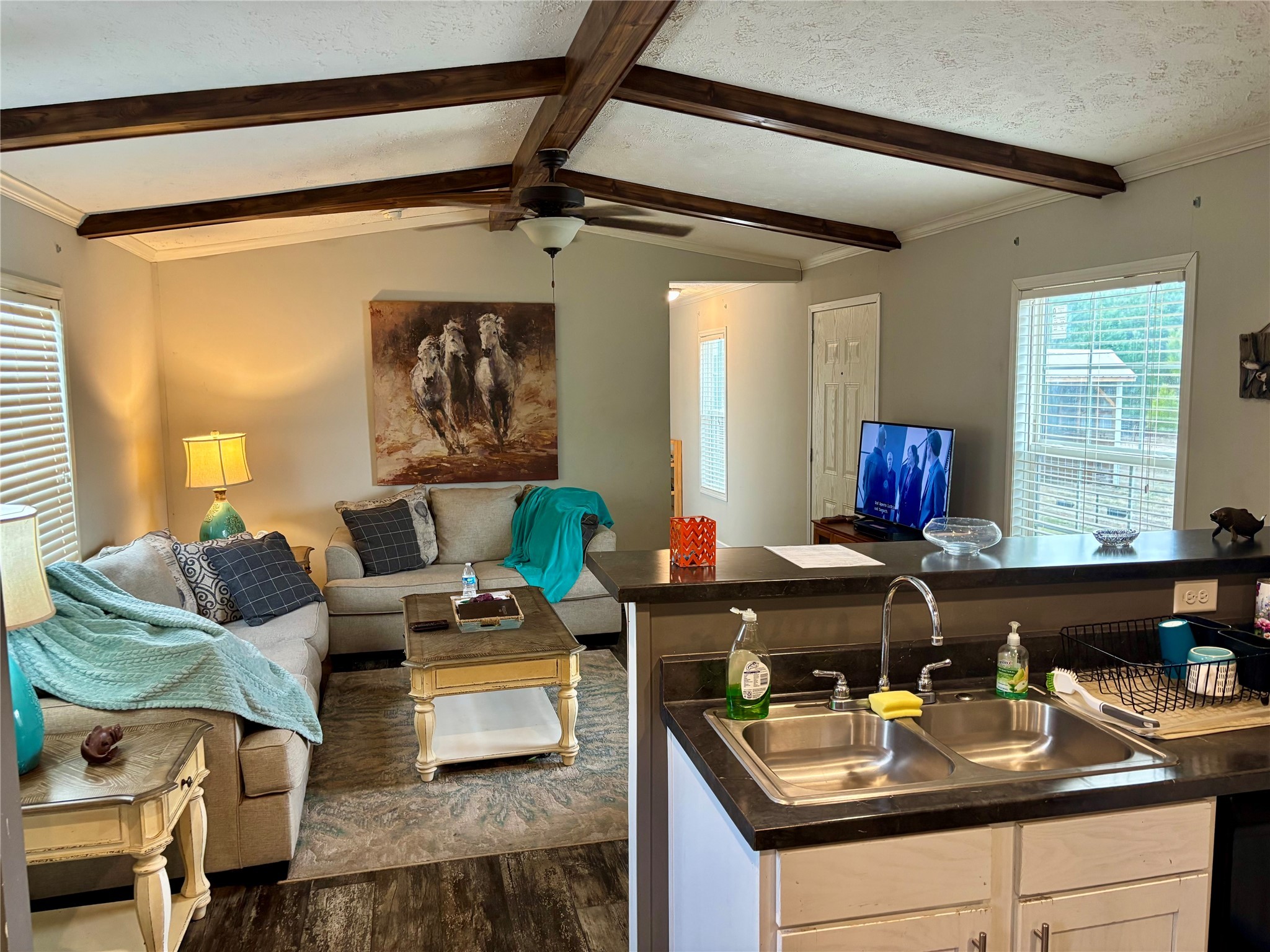 707 Bill Rasbeary Road Groveton, TX 75845 - Photo 36 of 48 a kitchen with a refrigerator and a stove