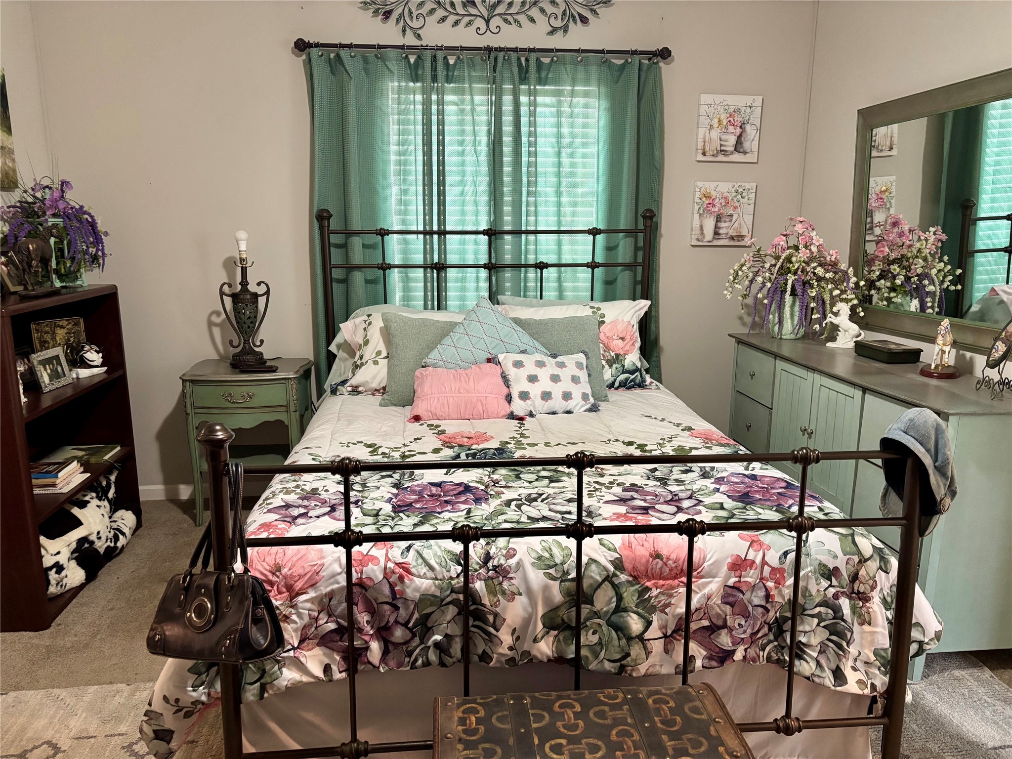 707 Bill Rasbeary Road Groveton, TX 75845 - Photo 44 of 48 a bed sitting in a bedroom next to a window