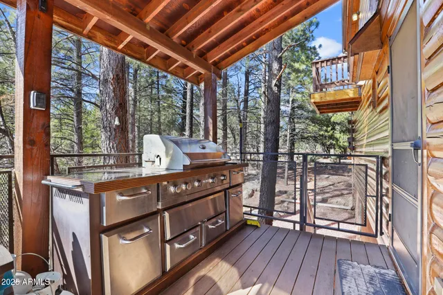 an outdoor space with wooden seating