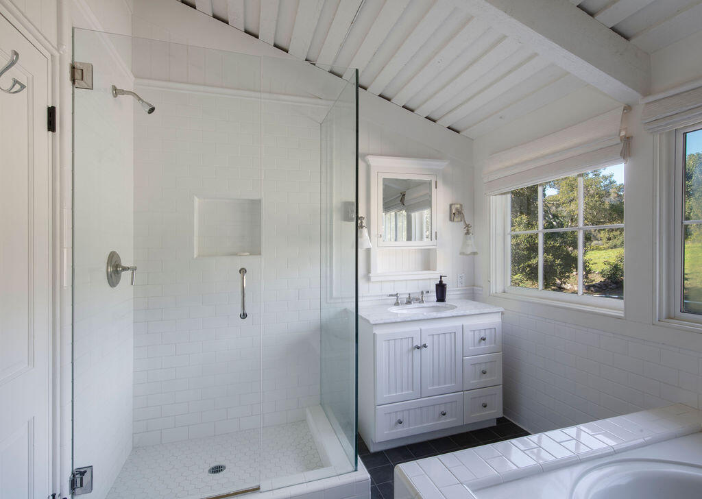 1835 Santa Monica Road Carpinteria, CA 93013 - Photo 18 of 31 a bathroom with a shower sink and mirror