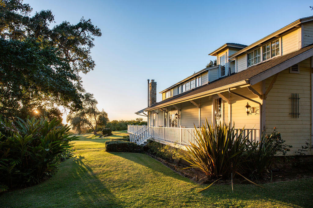 1835 Santa Monica Road Carpinteria, CA 93013 - Photo 7 of 31 a view of a house with a yard