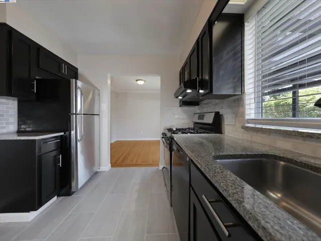 a balcony with trees in front of it