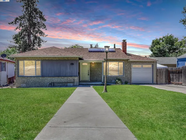 a view of a house with garden