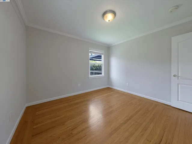 a view of a house with backyard and porch