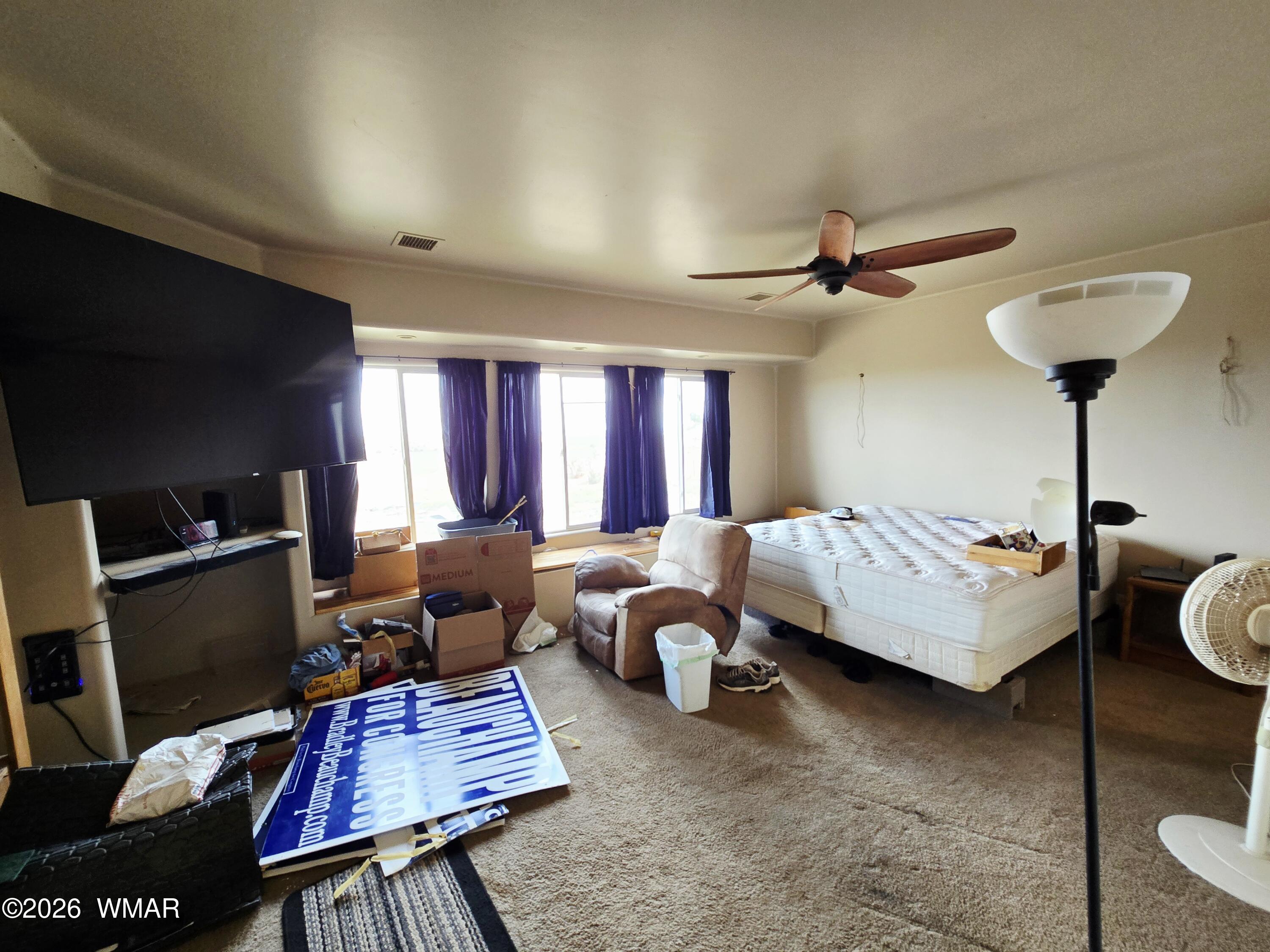9046 Miller Trail Snowflake, AZ 85937 - Photo 16 of 34 a living room with furniture and a window