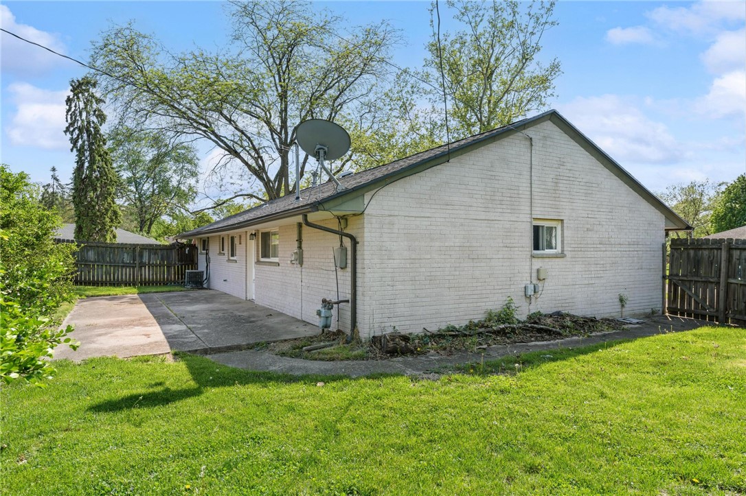 3890 Endover Road Dayton, OH 45439 - Photo 5 of 26 This residence offers ample outdoor space with a verdant yard and a functional concrete patio.