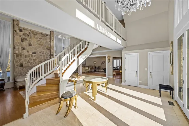 a view of entryway livingroom and hall with wooden floor