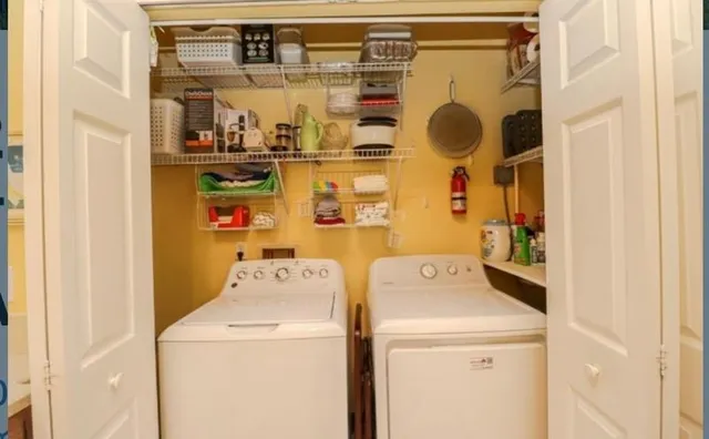 a utility room with dryer and washer