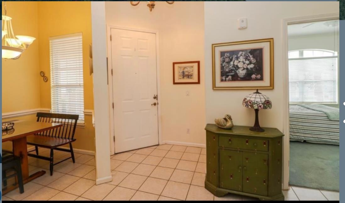 307 Augusta Circle St. Augustine, FL 32086 - Photo 10 of 31 a view of a workspace with furniture and a window