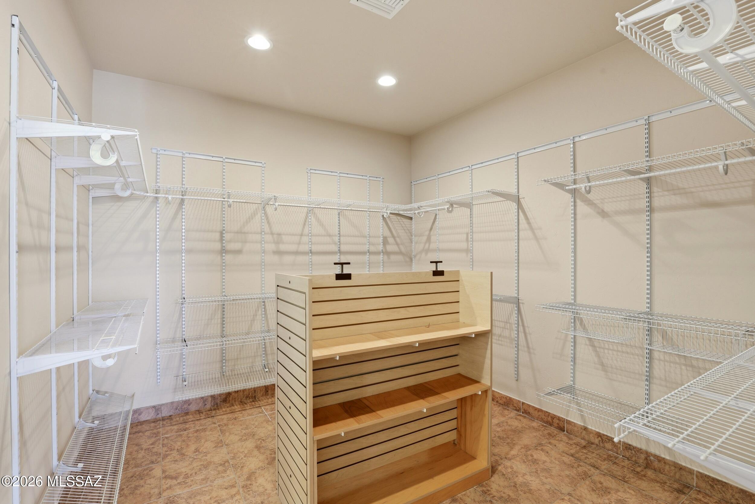 6331 West Trails End Road Tucson, AZ 85745 - Photo 16 of 41 a bathroom with a shower and a sink