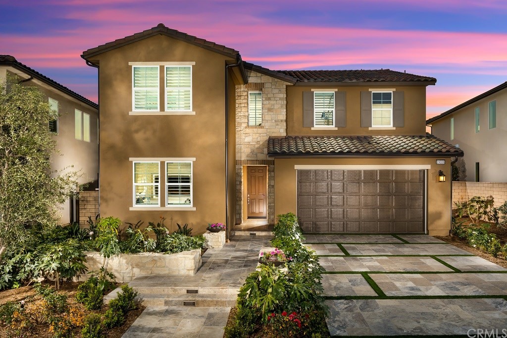19022 Sark Place Saugus, CA 91350 - Photo 1 of 12 a front view of a house with a yard