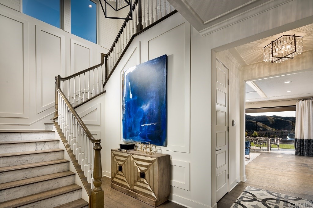 19022 Sark Place Saugus, CA 91350 - Photo 2 of 12 a view of a hallway with wooden floor and entryway