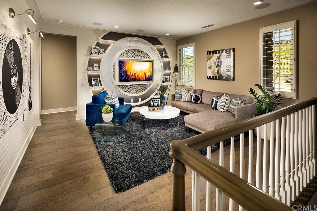 19022 Sark Place Saugus, CA 91350 - Photo 9 of 12 a living room with furniture and a flat screen tv