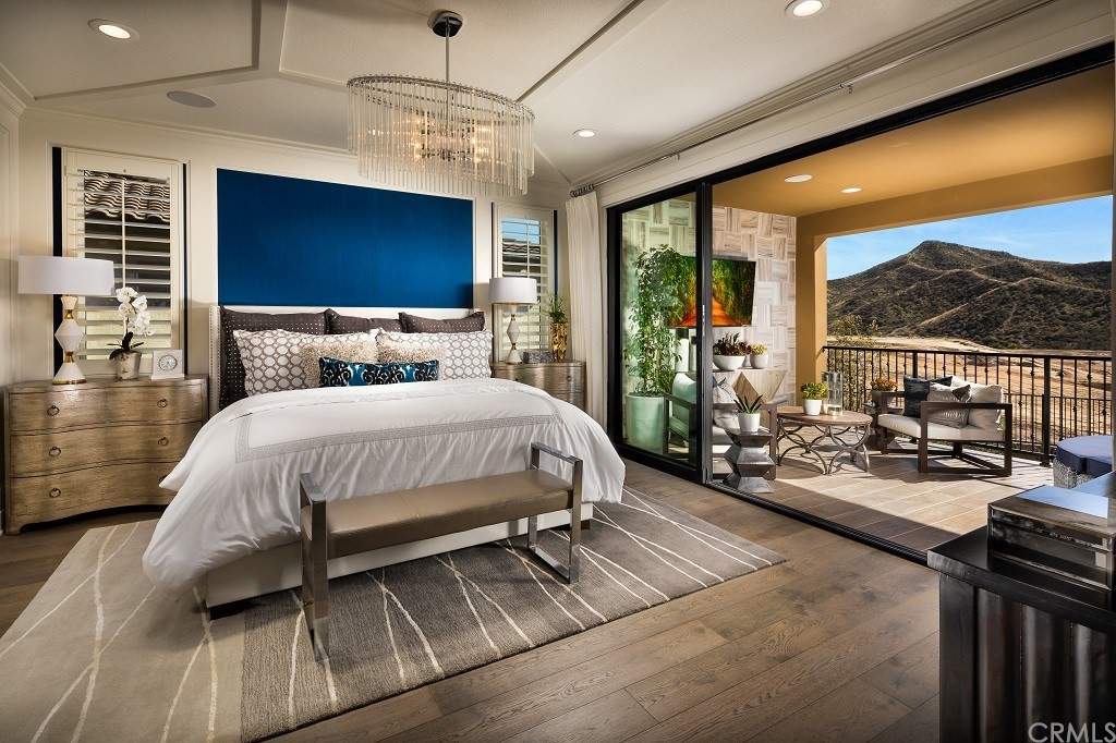 19022 Sark Place Saugus, CA 91350 - Photo 10 of 12 a bed sitting in a bedroom next to a window