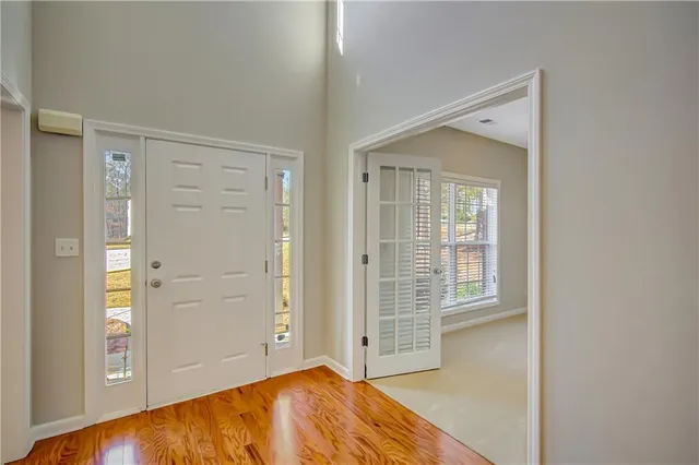 a living room with furniture fireplace and a flat screen tv