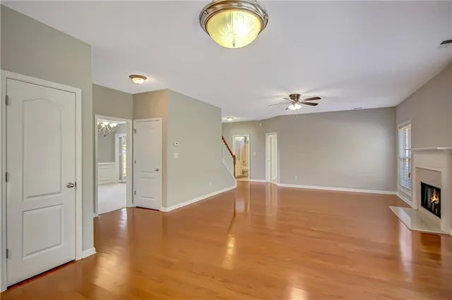 a large kitchen with kitchen island a large window a sink and counter space