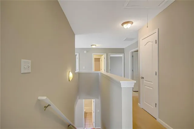 a spacious bathroom with a granite countertop sink a mirror and a