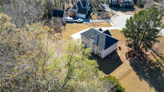 a view of house with yard