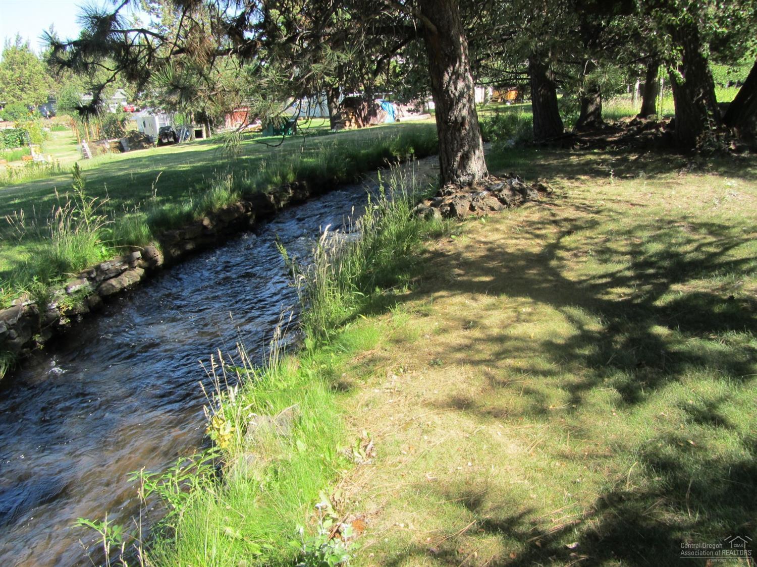 Picturesque small canal in this grassy t