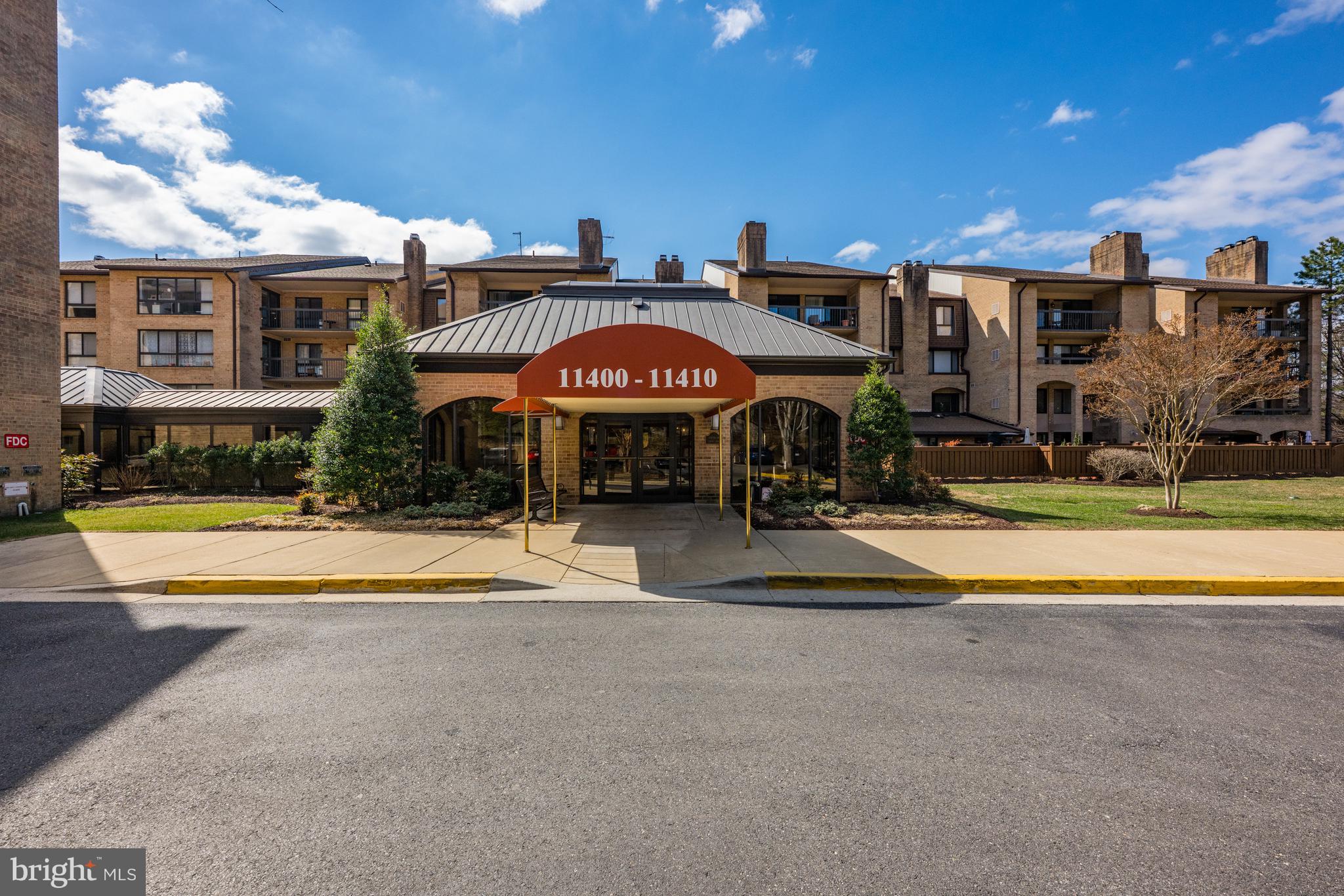 a view of a building with a swimming pool