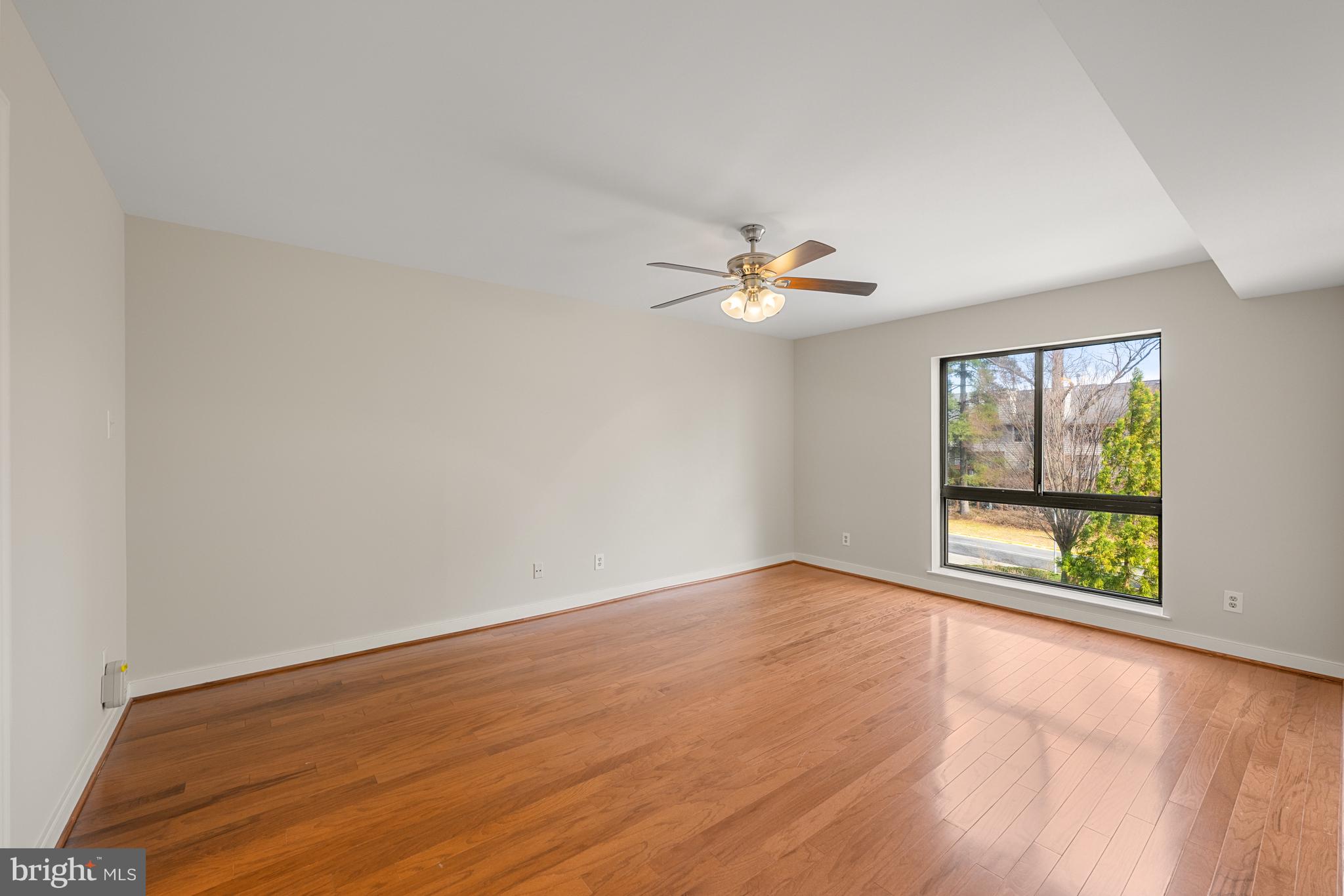 11400 Strand Drive, Unit R310 Rockville, MD 20852 - Photo 20 of 35 a view of an empty room with a window
