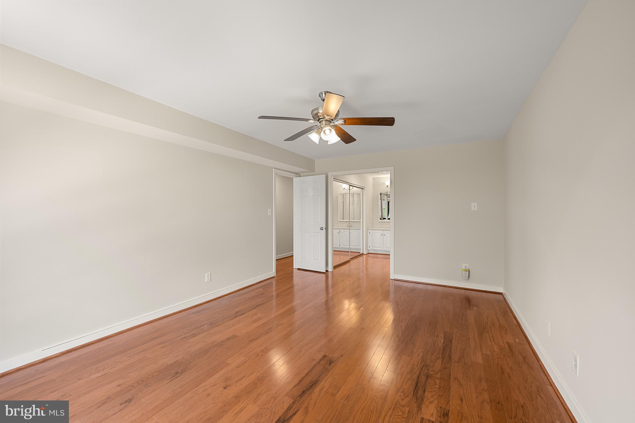 11400 Strand Drive, Unit R310 Rockville, MD 20852 - Photo 21 of 35 a view of empty room with wooden floor