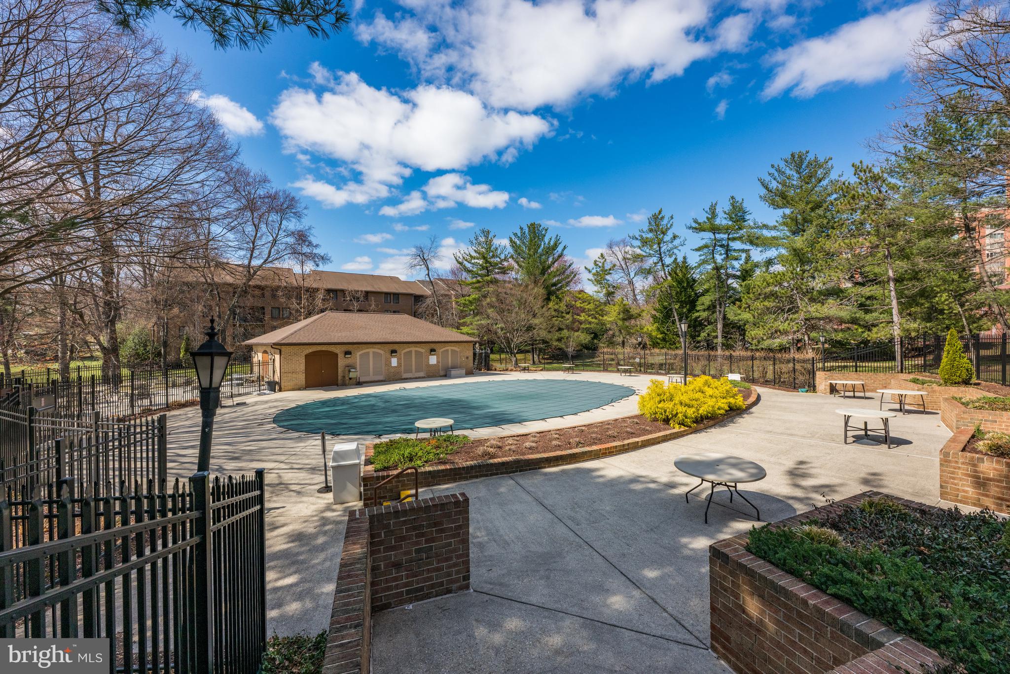 11400 Strand Drive, Unit R310 Rockville, MD 20852 - Photo 31 of 35 a view of a swimming pool with a patio
