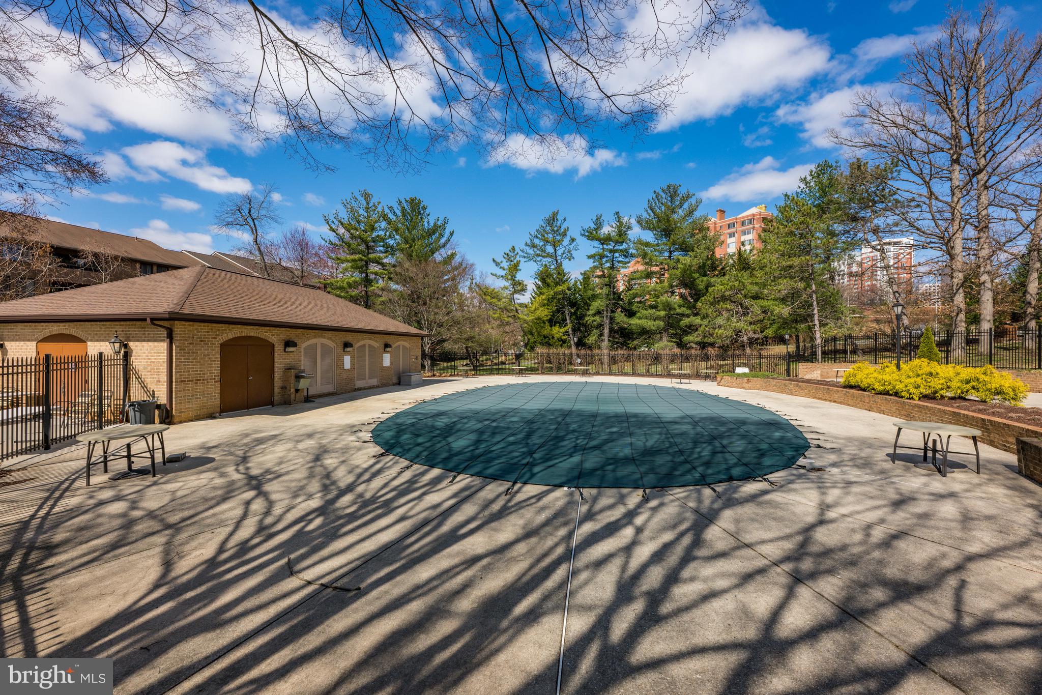 11400 Strand Drive, Unit R310 Rockville, MD 20852 - Photo 32 of 35 a view of a swimming pool with a yard