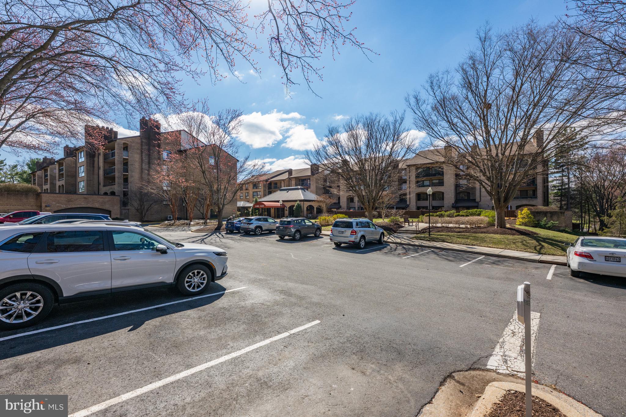 11400 Strand Drive, Unit R310 Rockville, MD 20852 - Photo 34 of 35 a view of a cars parked on the side of a street