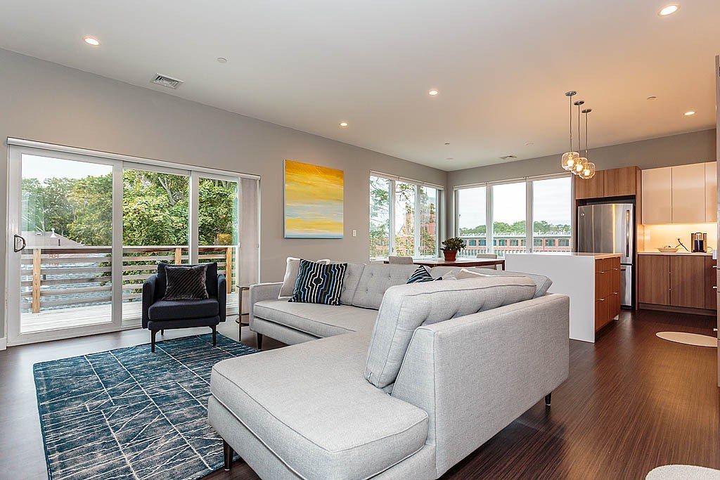 17 Ash Street Waltham, MA 02453 - Photo 14 of 32 a living room with furniture and a large window